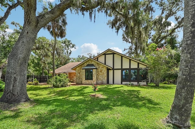 1509 Shadow Ridge Cir, Sarasota, FL 34240 - tudor-style house featuring stone siding and stucco siding