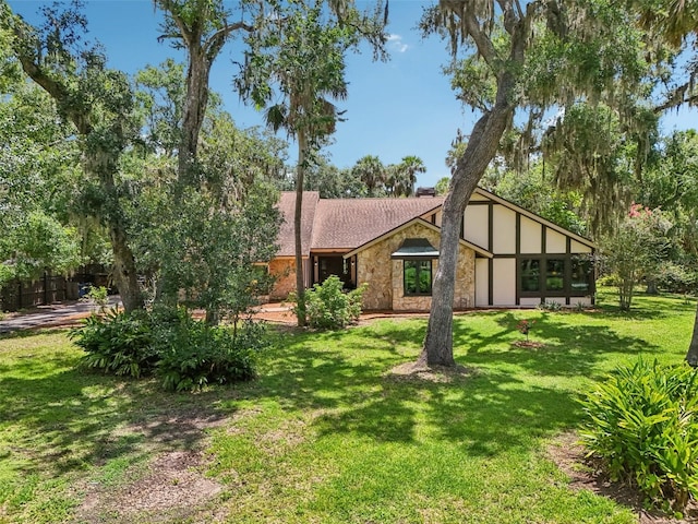 1509 Shadow Ridge Cir, Sarasota, FL 34240 - view of front of house featuring stone siding and a front yard