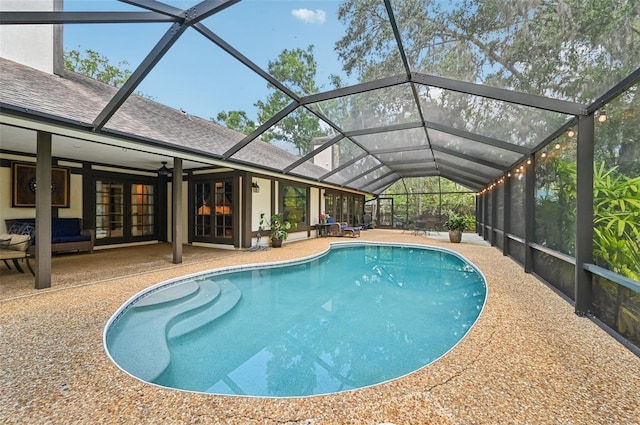 1509 Shadow Ridge Cir, Sarasota, FL 34240 - swimming pool featuring a patio area, french doors, a lanai, and an outdoor living space