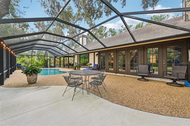 1509 Shadow Ridge Cir, Sarasota, FL 34240 - outdoor pool with french doors, a patio area, and glass enclosure