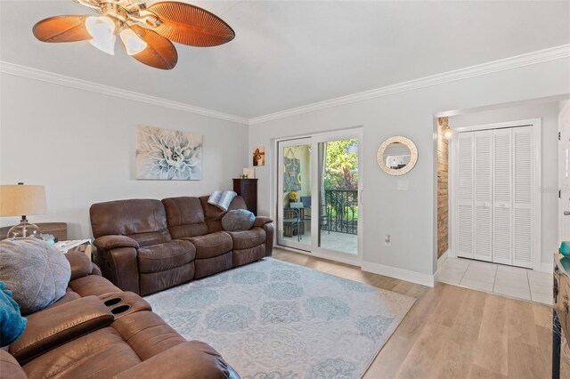 2415 Bayshore Gardens Pkwy Unit 2, Bradenton, FL 34207 - living room featuring ornamental molding, wood finished floors, and ceiling fan