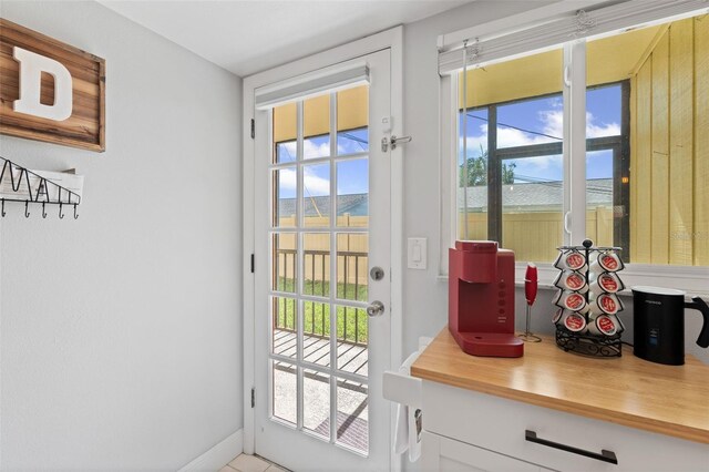 2415 Bayshore Gardens Pkwy Unit 2, Bradenton, FL 34207 - doorway to outside with baseboards