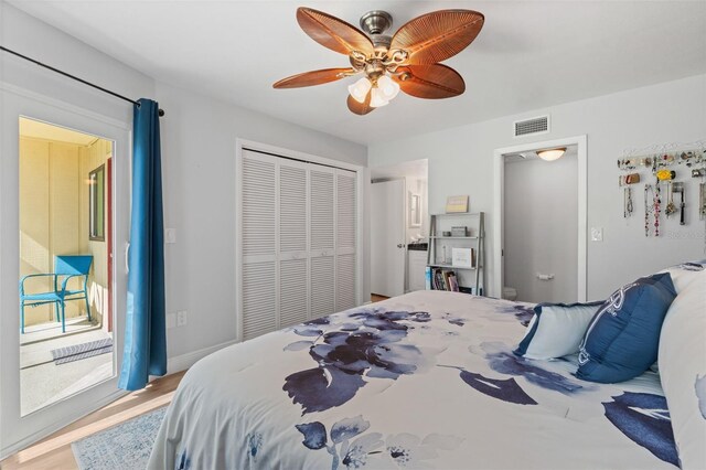 2415 Bayshore Gardens Pkwy Unit 2, Bradenton, FL 34207 - bedroom with a closet, wood finished floors, and ceiling fan