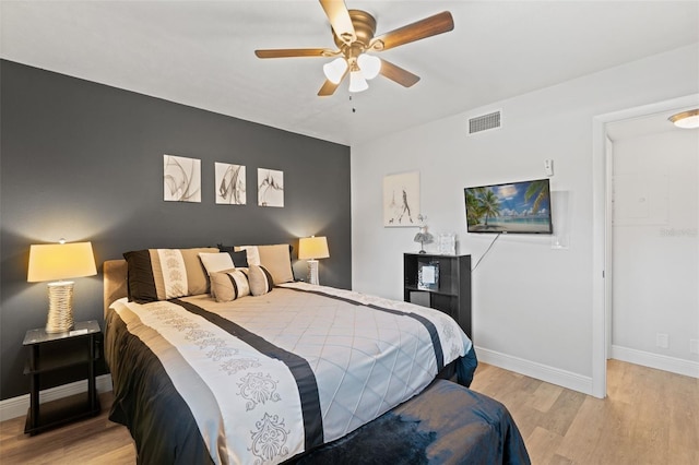 2415 Bayshore Gardens Pkwy Unit 2, Bradenton, FL 34207 - bedroom featuring light wood-type flooring and ceiling fan
