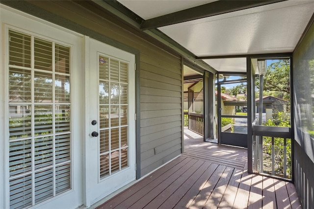 4333 Trails Dr Unit 10-1, Sarasota, FL 34232 - unfurnished sunroom featuring beam ceiling