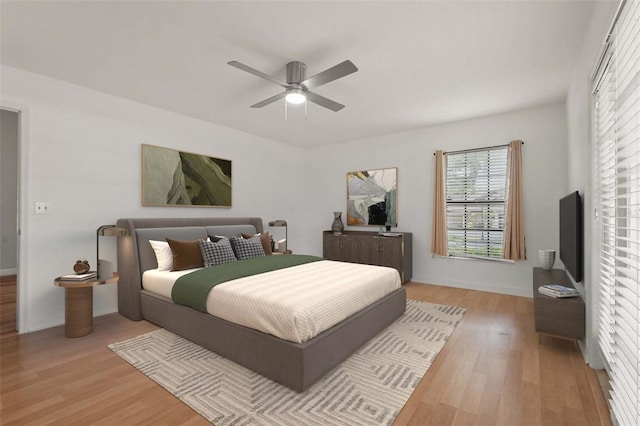4333 Trails Dr Unit 10-1, Sarasota, FL 34232 - bedroom featuring light wood-style flooring and ceiling fan