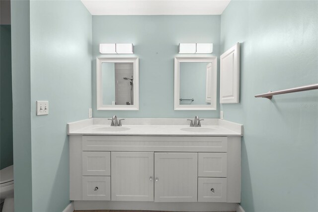 4333 Trails Dr Unit 10-1, Sarasota, FL 34232 - full bathroom with double vanity and toilet