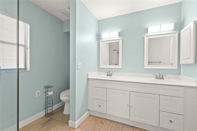 4333 Trails Dr Unit 10-1, Sarasota, FL 34232 - full bath with wood finished floors and double vanity