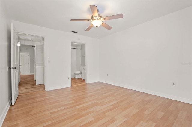 4333 Trails Dr Unit 10-1, Sarasota, FL 34232 - unfurnished bedroom with light wood finished floors, attic access, connected bathroom, and ceiling fan