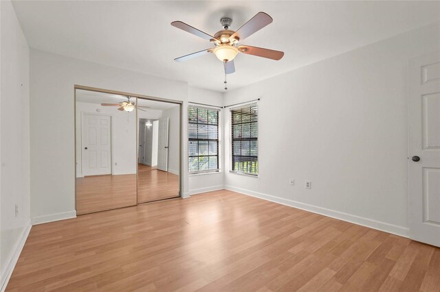 4333 Trails Dr Unit 10-1, Sarasota, FL 34232 - unfurnished bedroom featuring light wood-style floors and a ceiling fan