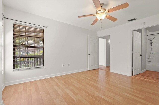 4333 Trails Dr Unit 10-1, Sarasota, FL 34232 - unfurnished bedroom with light wood-style flooring and ceiling fan