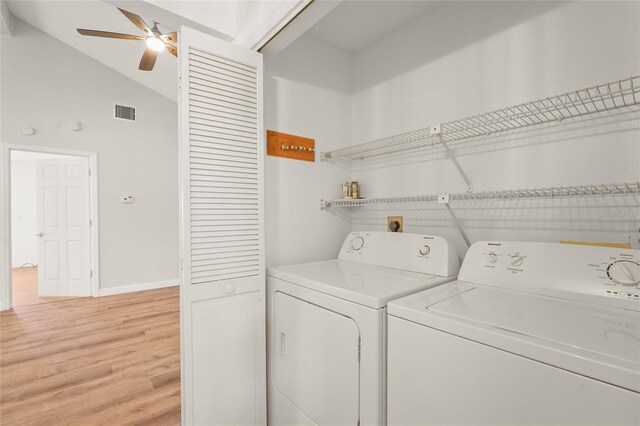 4333 Trails Dr Unit 10-1, Sarasota, FL 34232 - washroom with washer and clothes dryer, light wood finished floors, and a ceiling fan