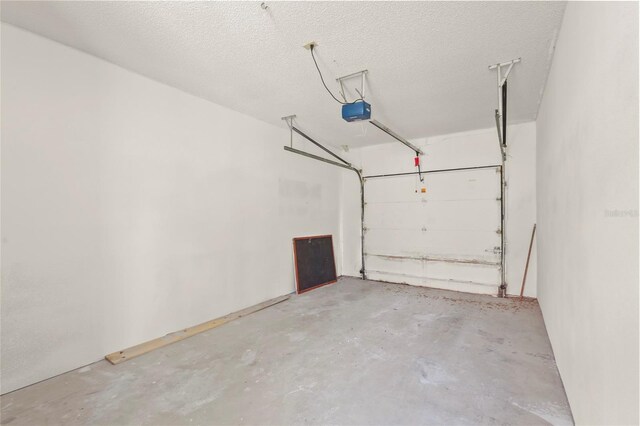 4333 Trails Dr Unit 10-1, Sarasota, FL 34232 - garage with a garage door opener