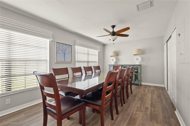 4333 Trails Dr Unit 10-1, Sarasota, FL 34232 - dining room with wood finished floors and a ceiling fan