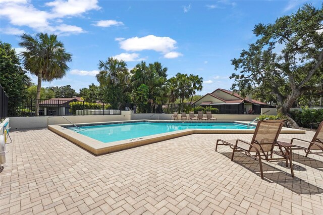 4333 Trails Dr Unit 10-1, Sarasota, FL 34232 - community pool featuring a patio