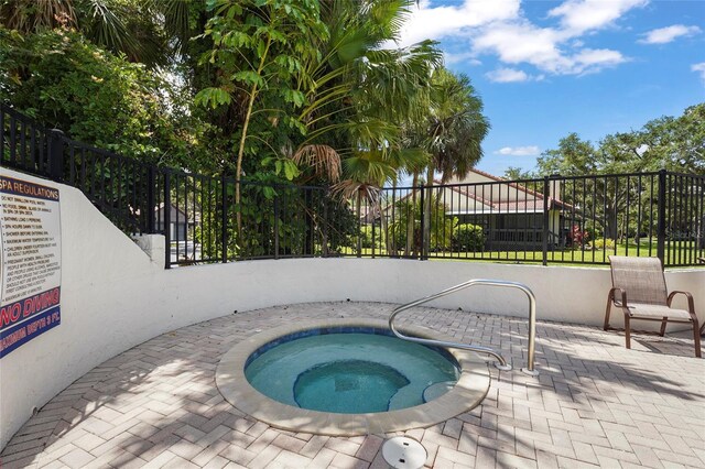 4333 Trails Dr Unit 10-1, Sarasota, FL 34232 - view of pool featuring a hot tub