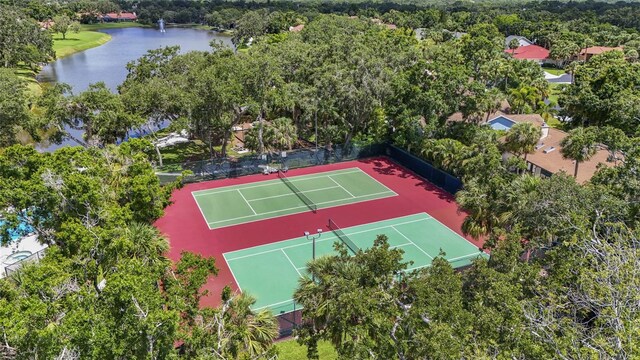 4333 Trails Dr Unit 10-1, Sarasota, FL 34232 - view of tennis court with a water view