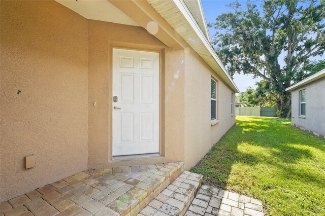 3362 Howell Pl, Sarasota, FL 34232 - property entrance featuring stucco siding