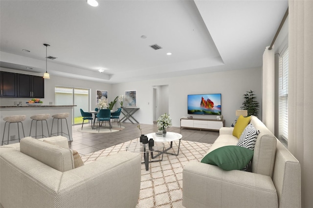 3362 Howell Pl, Sarasota, FL 34232 - living room with plenty of natural light, light tile patterned floors, recessed lighting, and a raised ceiling