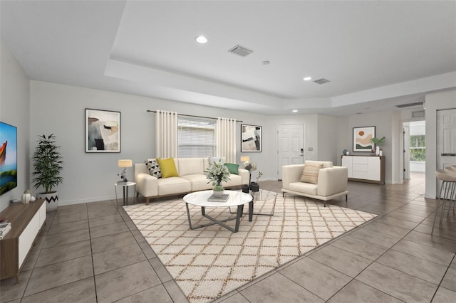 3362 Howell Pl, Sarasota, FL 34232 - tiled living room featuring a raised ceiling and recessed lighting