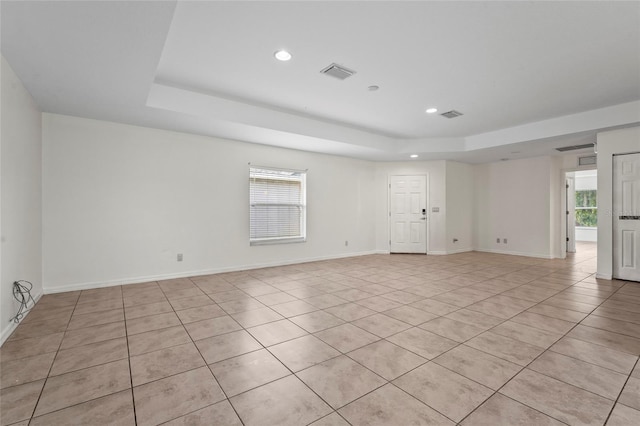 3362 Howell Pl, Sarasota, FL 34232 - unfurnished room with a raised ceiling, light tile patterned floors, and recessed lighting