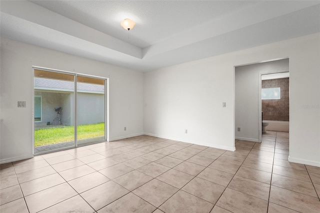3362 Howell Pl, Sarasota, FL 34232 - unfurnished room with light tile patterned flooring and baseboards