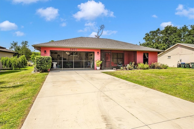 4145 W Price Blvd, North Port, FL 34286 - ranch-style home with a front lawn and driveway