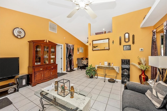 4145 W Price Blvd, North Port, FL 34286 - living room featuring ceiling fan, vaulted ceiling, and light tile patterned floors