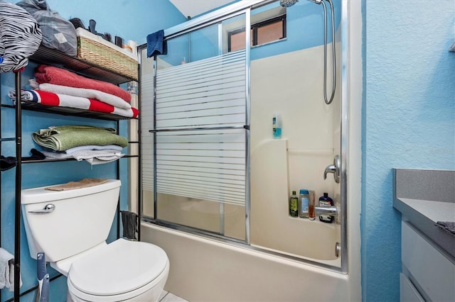 4145 W Price Blvd, North Port, FL 34286 - full bath with combined bath / shower with glass door, a textured wall, and vanity