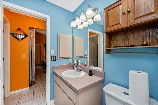 4145 W Price Blvd, North Port, FL 34286 - ensuite bathroom with vanity and tile patterned floors