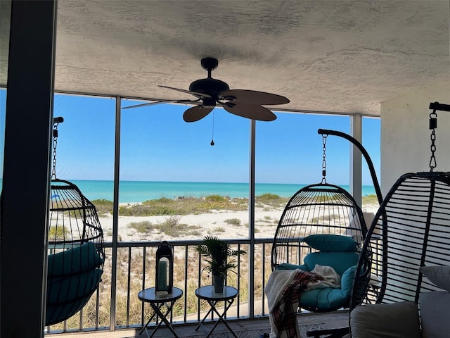555 The Esplanade N Unit 202, Venice, FL 34285 - patio / terrace featuring view of water and beach and ceiling fan