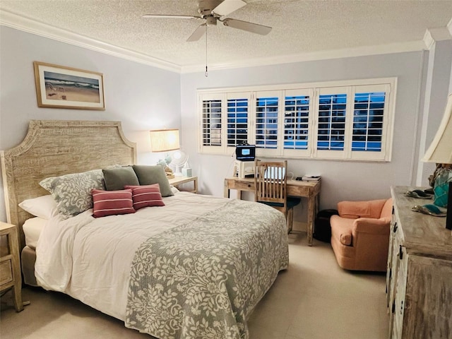 555 The Esplanade N Unit 202, Venice, FL 34285 - bedroom featuring carpet flooring, ornamental molding, a textured ceiling, and ceiling fan