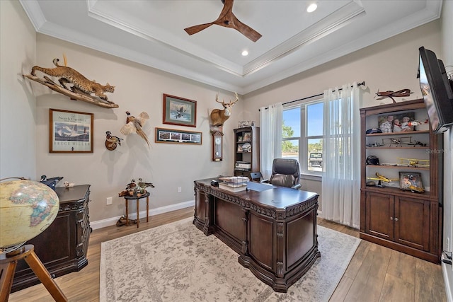 29527 Leah Rd, Punta Gorda, FL 33982 - office area featuring a tray ceiling, ornamental molding, a ceiling fan, light wood-type flooring, and recessed lighting