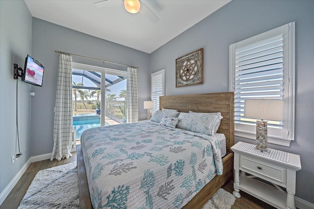 29527 Leah Rd, Punta Gorda, FL 33982 - bedroom with access to outside, wood finished floors, and a ceiling fan