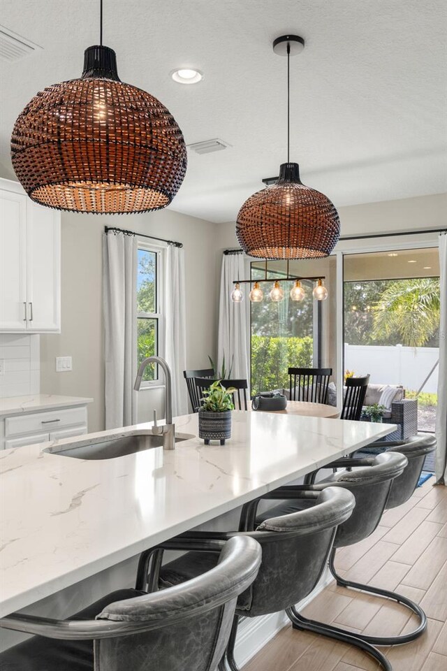 3621 Wild Blossom Pl, Parrish, FL 34219 - dining room featuring light wood finished floors and recessed lighting