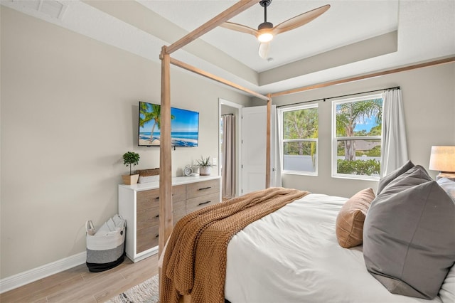 3621 Wild Blossom Pl, Parrish, FL 34219 - bedroom featuring light wood-type flooring and a ceiling fan