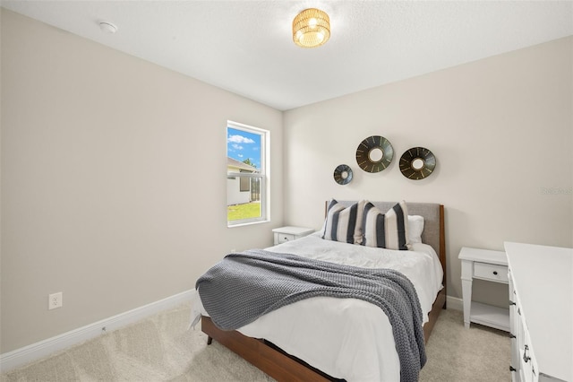 3621 Wild Blossom Pl, Parrish, FL 34219 - bedroom featuring light carpet and baseboards
