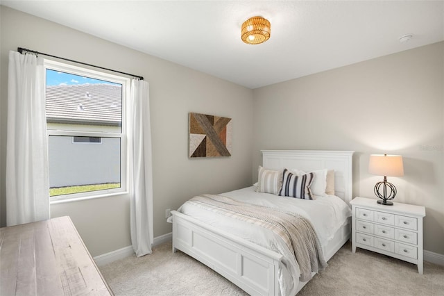 3621 Wild Blossom Pl, Parrish, FL 34219 - bedroom featuring light carpet and baseboards