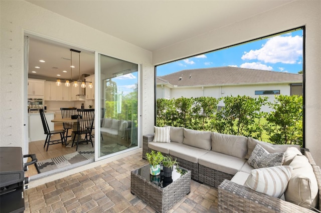 3621 Wild Blossom Pl, Parrish, FL 34219 - sunroom / solarium with an outdoor living space