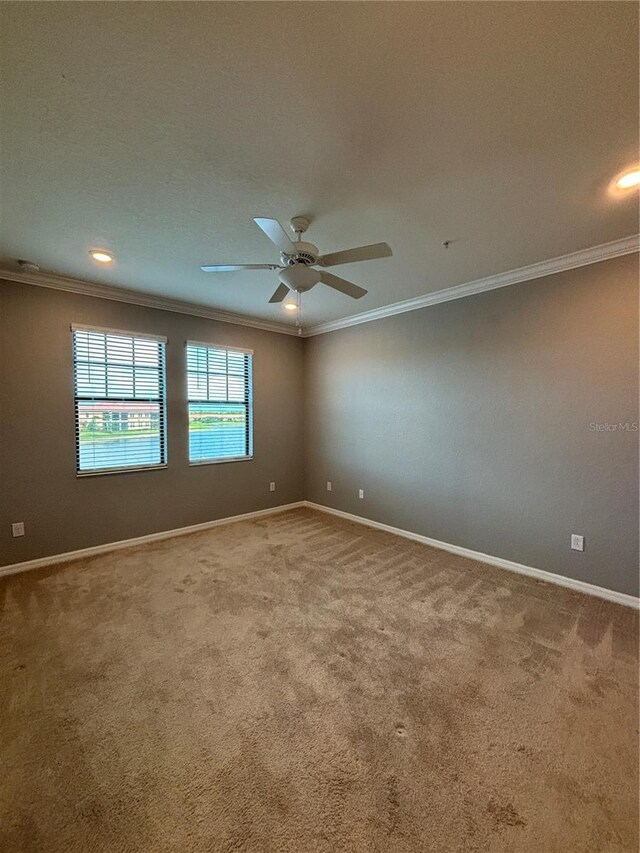 10054 Crooked Creek Dr Unit 201, Venice, FL 34293 - empty room featuring crown molding, carpet, a ceiling fan, and recessed lighting