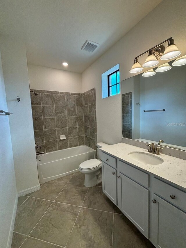 10054 Crooked Creek Dr Unit 201, Venice, FL 34293 - full bathroom with vanity, tile patterned floors, and tub / shower combination