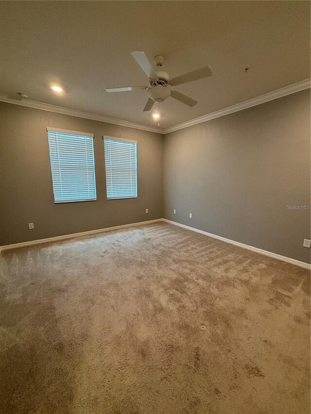 10054 Crooked Creek Dr Unit 201, Venice, FL 34293 - carpeted spare room featuring ornamental molding, a ceiling fan, and recessed lighting