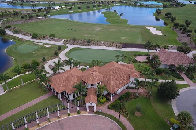 10054 Crooked Creek Dr Unit 201, Venice, FL 34293 - drone / aerial view of a large body of water and a golf club