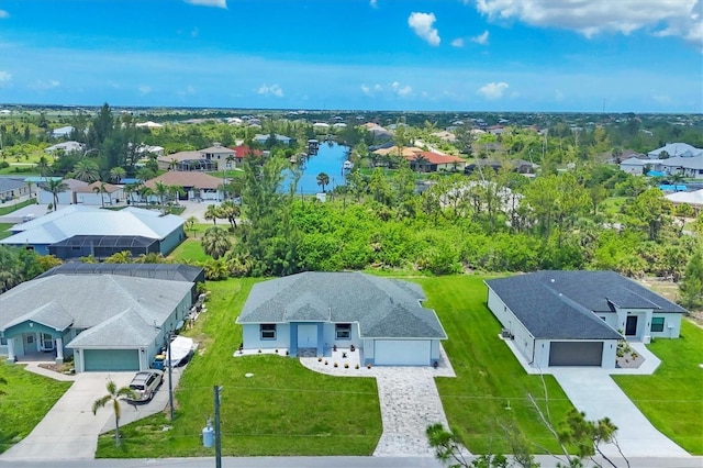 10443 Riverside Rd, Port Charlotte, FL 33981 - aerial perspective of suburban area featuring a nearby body of water