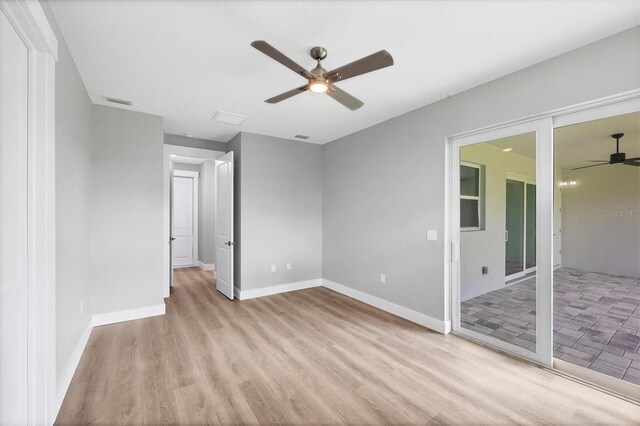 10443 Riverside Rd, Port Charlotte, FL 33981 - spare room with a ceiling fan and light wood finished floors