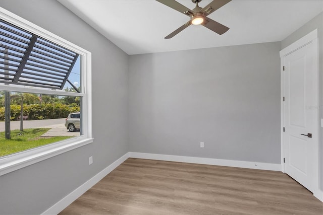 10443 Riverside Rd, Port Charlotte, FL 33981 - unfurnished room with ceiling fan and light wood-style floors