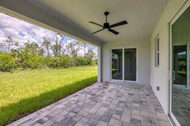10443 Riverside Rd, Port Charlotte, FL 33981 - view of patio / terrace featuring a ceiling fan
