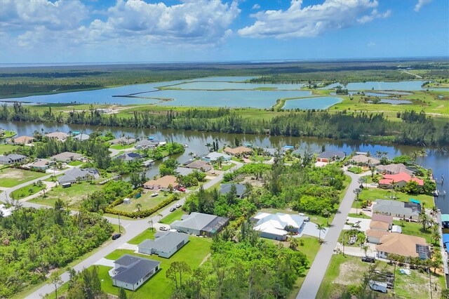 10443 Riverside Rd, Port Charlotte, FL 33981 - aerial view of residential area with a nearby body of water