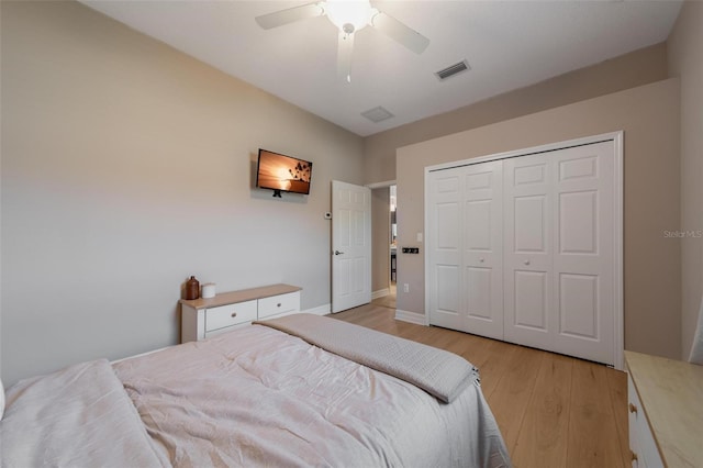 14901 17th Ave E, Bradenton, FL 34212 - bedroom with light wood-style floors, a ceiling fan, and a closet