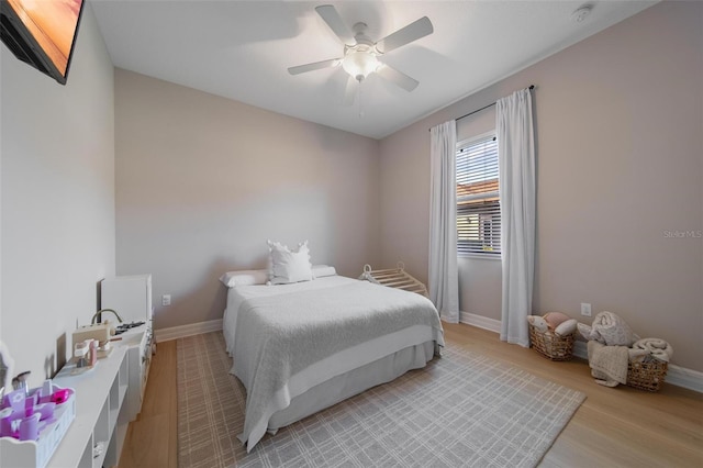 14901 17th Ave E, Bradenton, FL 34212 - bedroom featuring light wood finished floors and a ceiling fan